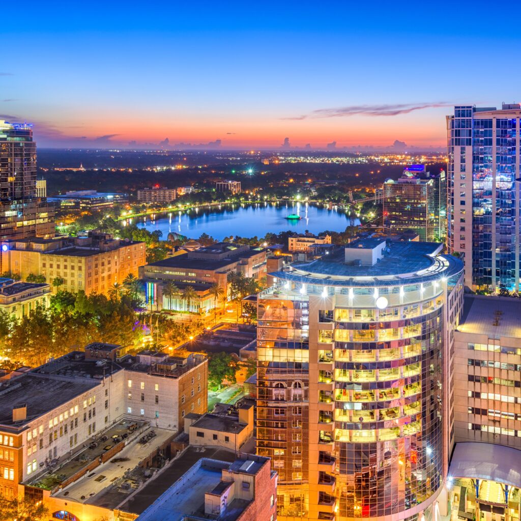 Orlando, Florida, USA aerial cityscape towards Eola Lake.