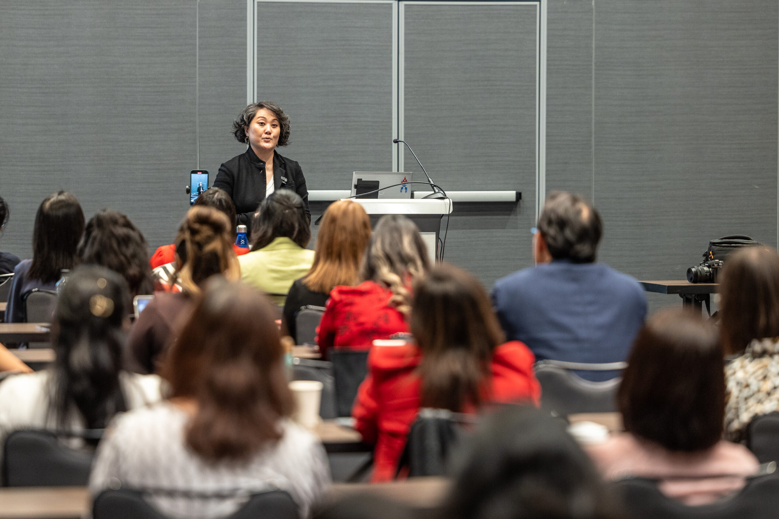 A room full of professionals learning